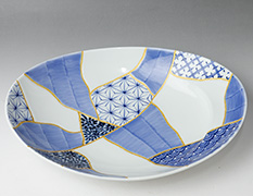 Oval bowl with Patchwork of Traditonal Patterns Design
